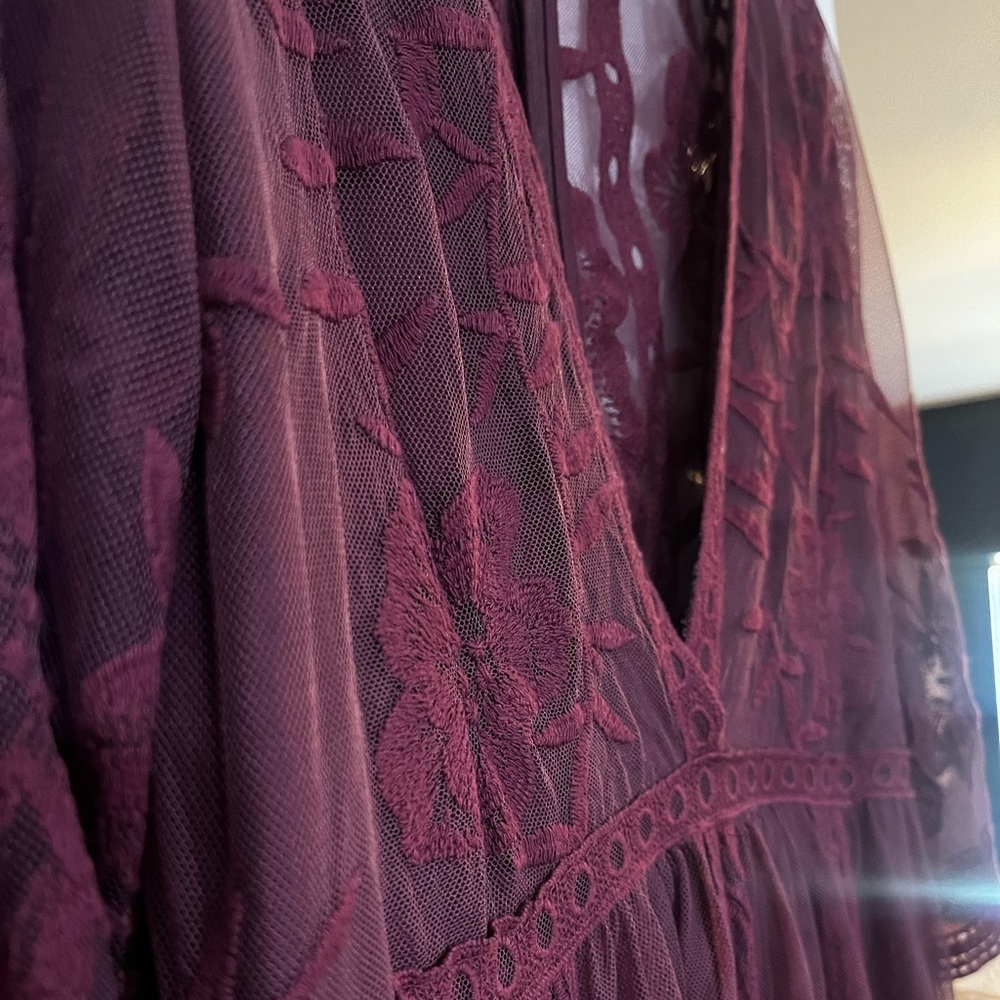 Marriott colored dress with sheer back and bottom.